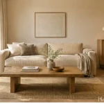 Warm minimalist living room with natural materials, soft textiles and uncluttered surfaces